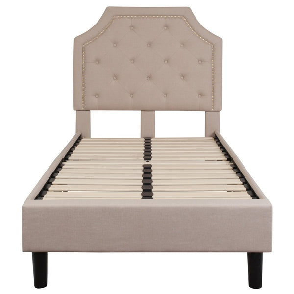 English Elm Brighton Full Size Tufted Upholstered Platform Bed – Elegant Design with Arched Headboard & Nailhead Trim Beige In Stock. Usually ships in 24 - 48 business hours SL-BK4-T-B-GG