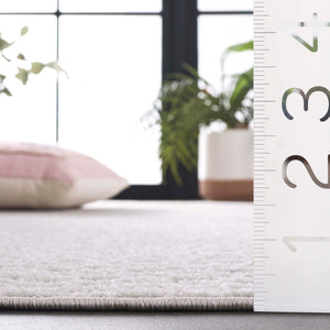 Safavieh Stella Elegant Geometric Area Rug - Versatile Indoor & Outdoor Decor For Timeless Style & Comfort Ivory Polypropylene Pile Sta111b-9