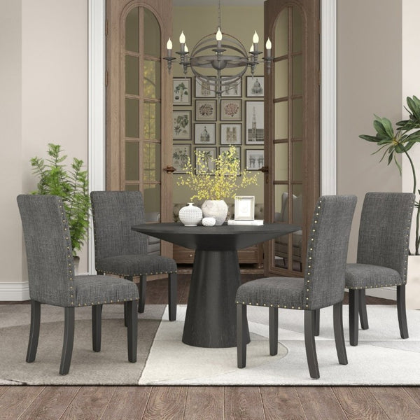 English Elm Nuevo Round Pedestal Dining Set Oak Veneer Table Four Nailhead Upholstered Chairs Gray T2574S00416