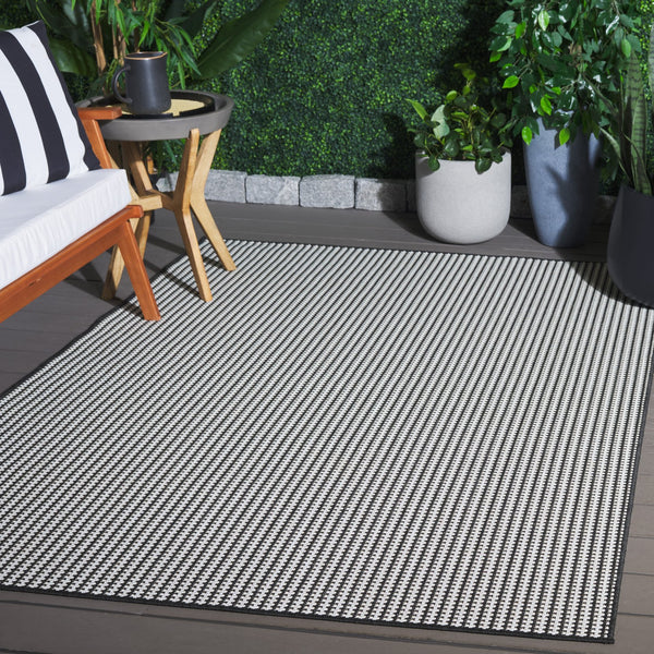 Safavieh Terrace Modern Black And White Geometric Dot Area Rug — Durable Low-Pile Indoor/Outdoor Accent Rug 5'-3" x 7'-6" TER802Z-5
