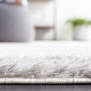 Safavieh Tahoe Shag Area Rug - Luxurious Ivory And Grey Design For Modern Living Spaces And Cozy Comfort Ivory ,Grey 60% Polypropylene,Jute 40% Tho653a-4