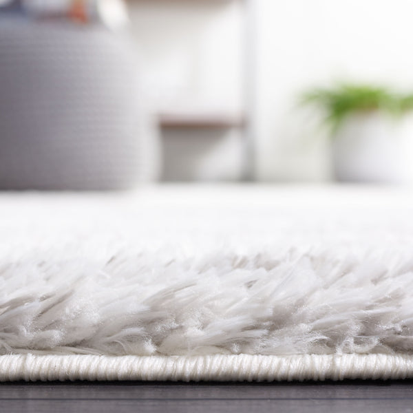 Safavieh Tahoe Shag Area Rug - Luxurious Ivory And Grey Design For Modern Living Spaces And Cozy Comfort Ivory ,Grey 60% Polypropylene,Jute 40% Tho653a-4