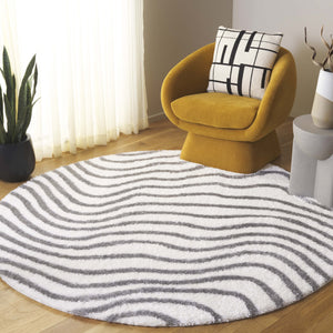 Safavieh Tahoe Shag Area Rug - Luxurious Gold And Ivory Design For Elegant Home Décor And Comfort Ivory ,Grey 60% Polypropylene,Jute 40% Tho680f-5