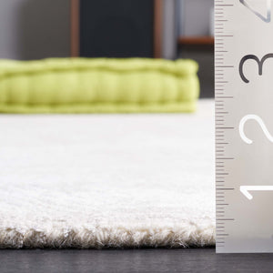 Safavieh Textural 106 Hand Tufted Modern Rug Beige 5' x 8'