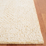 Safavieh Textural 305 Hand Tufted Contemporary Rug Gold / Ivory 5' x 8'