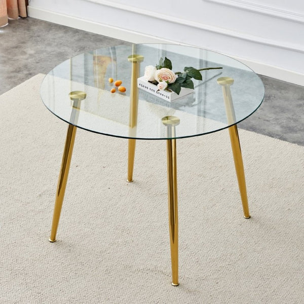 English Elm A Round Tempered Glass Dining Table with Gold Metal Legs Seats Four to Six W1151S04954