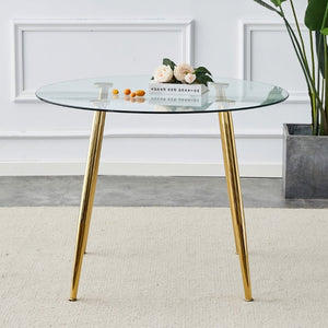 English Elm A Round Tempered Glass Dining Table with Gold Metal Legs Seats Four to Six W1151S04954