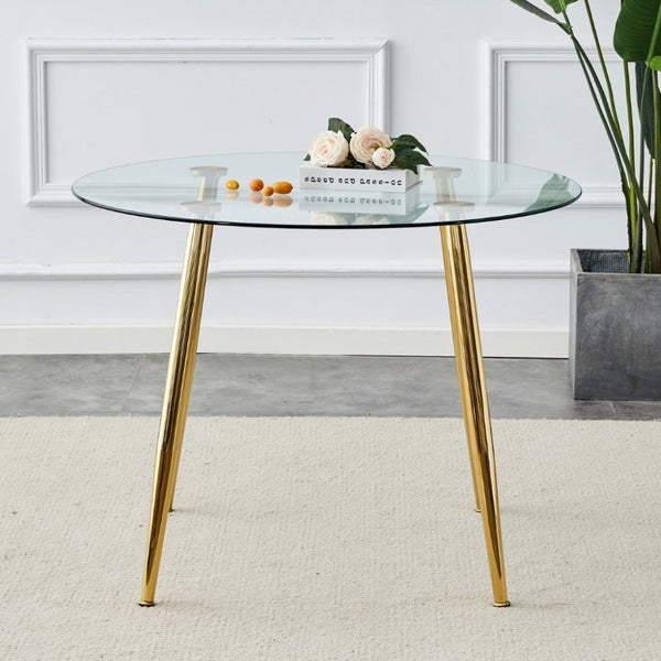 English Elm A Round Tempered Glass Dining Table with Gold Metal Legs Seats Four to Six W1151S04954