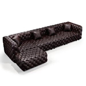English Elm 134.4" Modular Faux Leather Sectional with Button Tufting Ottoman and Pillows Included Brown W1885S00504
