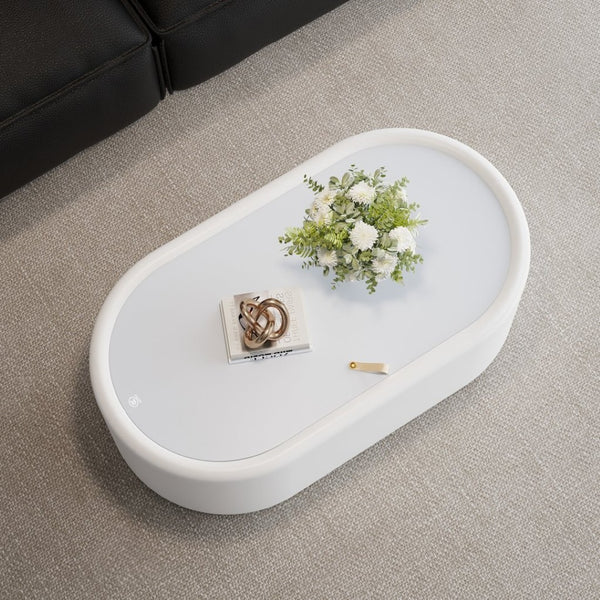English Elm 33.46 Oval White Leather Storage Coffee Table with Tempered Glass Lid for Living Room W3158P496087