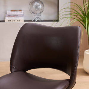 English Elm This Swivel Dining Chair Offers Faux Leather Comfort with a Hollow Curved High Back W3612P506907