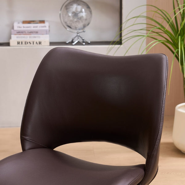 English Elm This Swivel Dining Chair Offers Faux Leather Comfort with a Hollow Curved High Back W3612P506907