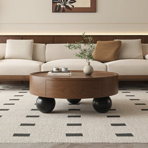 English Elm 35.43 Inch Round Walnut Finish Coffee Table with Hidden Drawer and Black Sphere Legs W6002S00007