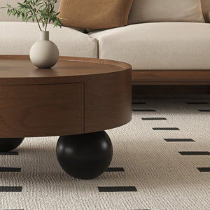 English Elm 35.43 Inch Round Walnut Finish Coffee Table with Hidden Drawer and Black Sphere Legs W6002S00007
