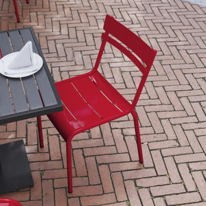 English Elm Nash Commercial Grade Steel Stack Chair - Durable Armless Design for Indoor and Outdoor Seating Red XU-CH-10318-RED-GG