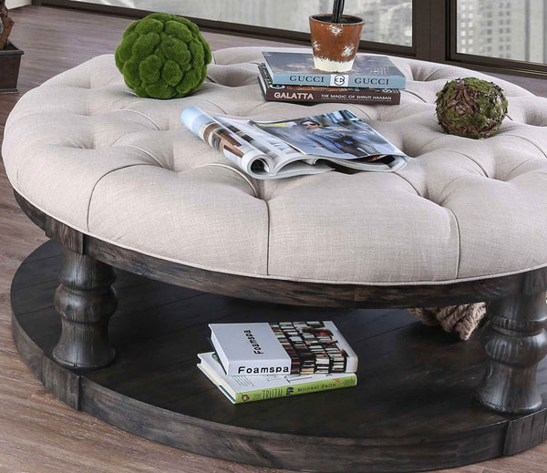 English Elm Rustic Round Wooden Coffee Table 48" Dia x 20" H with Weathered Finish, Turned Legs, Open Shelf and Button-Tufted Beige Linen Top Antique Grey 51 L x 51 W x 13 H B2741P357495