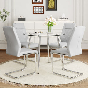 English Elm A Modern Minimalist Round Transparent Tempered Glass Table With Silver Metal Legs and 4 Modern Pu Leather High-Backed Dining Chairs For A Luxurious Experience.