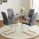 English Elm A Modern Minimalist Round Transparent Tempered Glass Table With Silver Metal Legs and 4 Modern Pu Leather High-Backed Dining Chairs For A Luxurious Experience.