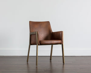 Sunpan Bernadette Dining Armchair – Elegant Design with Antique Brass Frame and Durable Faux Leather Upholstery Bravo Cognac