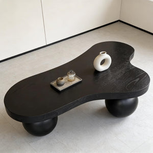 English Elm 46 Inch Cloud Shaped Coffee Table with Ash Veneer Top and Sculptural Sphere Legs Black W3935S00006