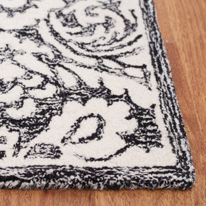 Safavieh Blossom 106 Hand Tufted Country and Floral Rug Black / Ivory BLM106Z-4