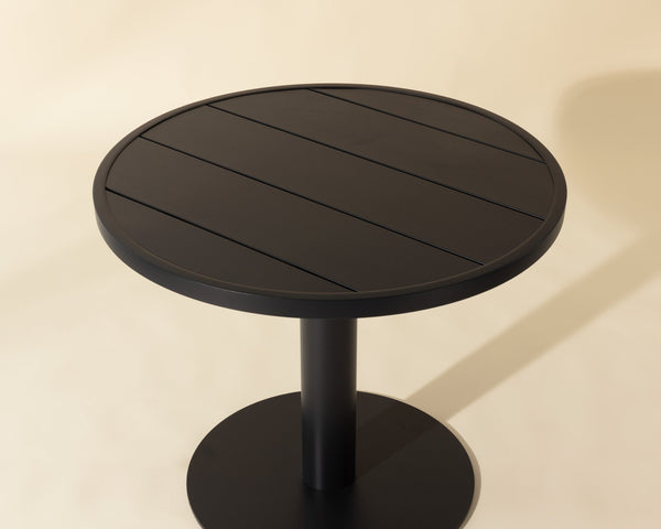 Sunpan Merano Bistro Table - Stylish Round Black Aluminium Design With Slatted Top For Modern Spaces Black Aluminum 111867
