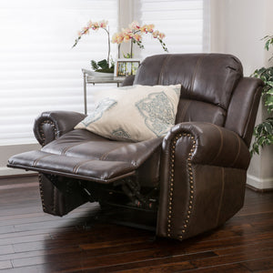 English Elm Christopher Knight Home® - GLIDING Recliner with Faux Leather Upholstery, Nailhead Trim, Foam Support and Pushback Comfort Dark Brown 57339.00PU