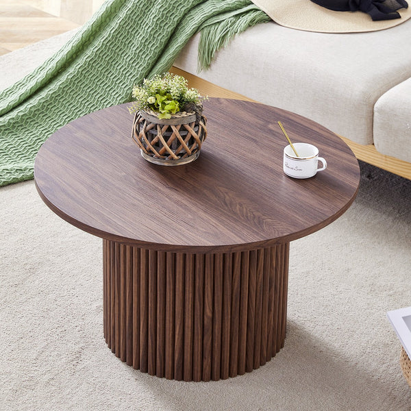 English Elm A modern circular coffee table Walnut MDF with hidden storage, cylindrical textured legs, polished edge detail, 27.5" diameter W1512P410543