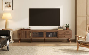 English Elm 76" Modern Minimal TV Stand with Waveform Glass Doors, Soft-Close Drawers, Cable Management, Solid Wood Legs (Fits TVs up to 85") N710P298234P
