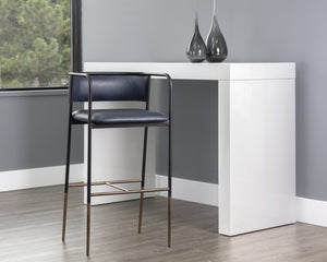 Sunpan Brenan Counter Stool - Elegant Curved Backrest, Unique Faux Leather, Black Metal Frame & Brass Caps Bravo Admiral