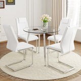 English Elm A Modern Minimalist Round Transparent Tempered Glass Table With Silver Metal Legs and 4 Modern Pu Leather High-Backed Dining Chairs For A Luxurious Experience.