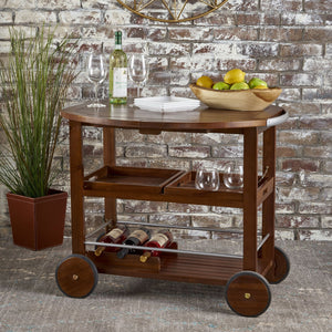 English Elm Christopher Knight Home® - BAR Tillary Outdoor Acacia Wood Drop-Leaf Bar Cart with Wine Rack, Drawers & Aluminum Wheels, Oak 60987.00