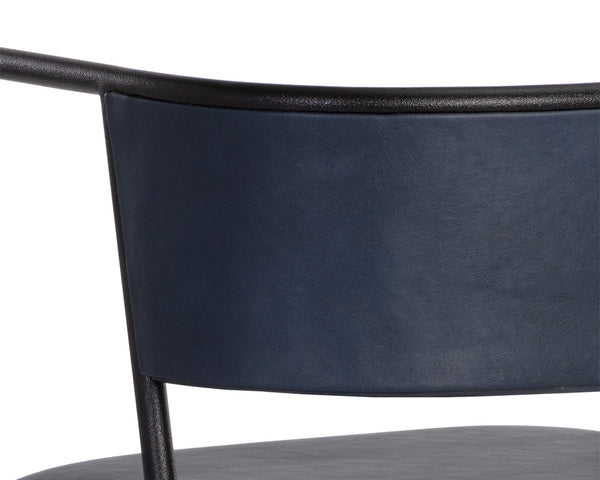 Sunpan Brenan Dining Armchair – Elegant Curved Backrest, Faux Leather Comfort, Black Metal Frame, Unique Craftsmanship Bravo Admiral
