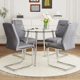 English Elm A Modern Minimalist Round Transparent Tempered Glass Table With Silver Metal Legs and 4 Modern Pu Leather High-Backed Dining Chairs For A Luxurious Experience.