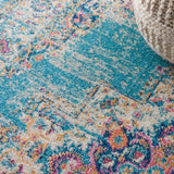 Nourison Passion PSN03 Machine Made Power-loomed Ornamental Border Indoor Only Bohemian Vintage Rug Light Blue, Ivory Light Blue 100% Polypropylene 99446477545