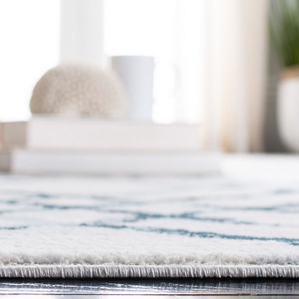 Safavieh Isabella 957 Power Loomed Transitional Rug Ivory / Turquoise ISA957A-4