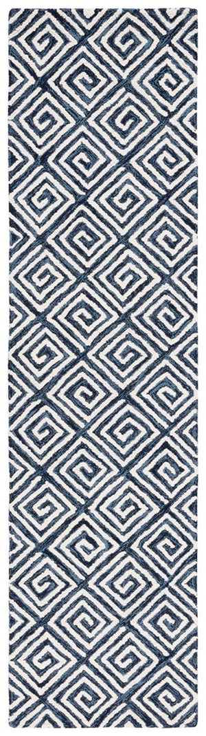 Safavieh Metro 455 Hand Tufted Contemporary Rug Navy / Ivory MET455N-9