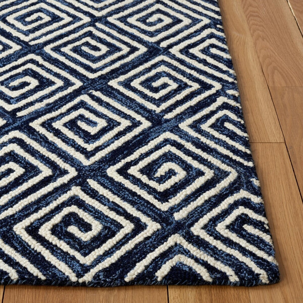 Safavieh Metro 455 Hand Tufted Contemporary Rug Navy / Ivory MET455N-9