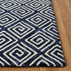 Safavieh Metro 455 Hand Tufted Contemporary Rug Navy / Ivory MET455N-9