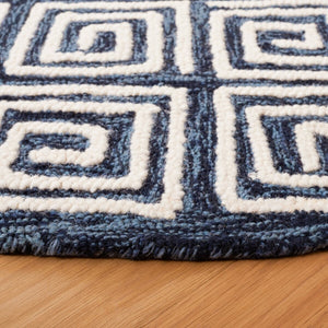 Safavieh Metro 455 Hand Tufted Contemporary Rug Navy / Ivory MET455N-9