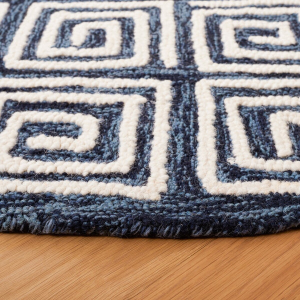 Safavieh Metro 455 Hand Tufted Contemporary Rug Navy / Ivory MET455N-9