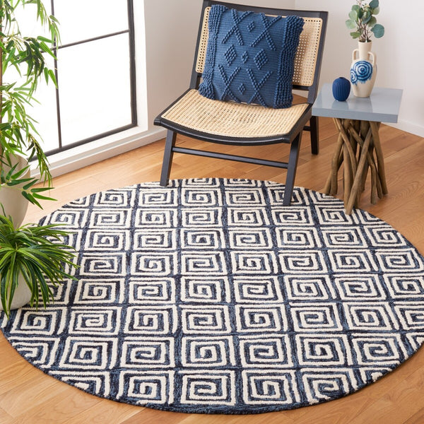 Safavieh Metro 455 Hand Tufted Contemporary Rug Navy / Ivory MET455N-9