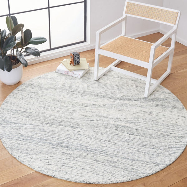 Safavieh Metro 995 Hand Tufted  Rug Dark Grey / Ivory MET995H-9