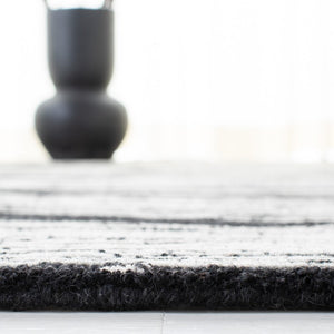 Safavieh Metro 995 Hand Tufted  Rug Black / Ivory MET995Z-9
