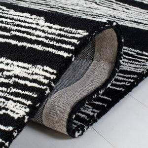 Safavieh Metro 995 Hand Tufted  Rug Black / Ivory MET995Z-9