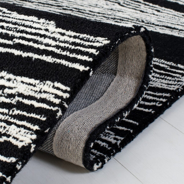 Safavieh Metro 995 Hand Tufted  Rug Black / Ivory MET995Z-9