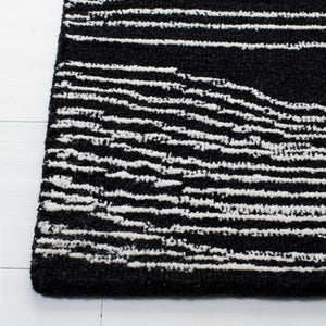 Safavieh Metro 995 Hand Tufted  Rug Black / Ivory MET995Z-9
