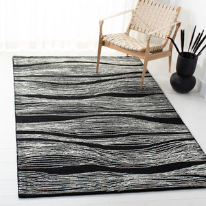 Safavieh Metro 995 Hand Tufted  Rug Black / Ivory MET995Z-9