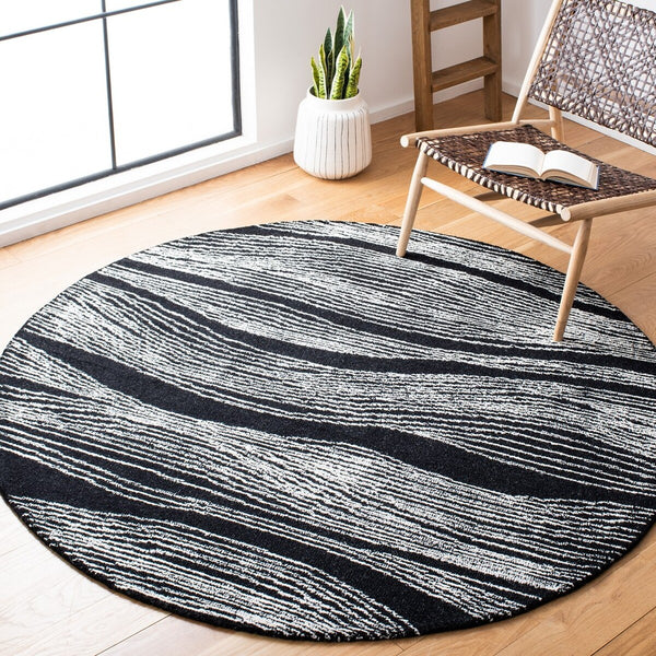 Safavieh Metro 995 Hand Tufted  Rug Black / Ivory MET995Z-9