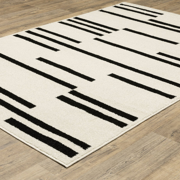 Oriental Weavers Quinn Modern Beige & Black Area Rug With Asymmetrical Linear Design, Durable Low-Maintenance Frieze (5'3" X 7'8") 83.86'' L x 62.99'' W QQUI10160213ST